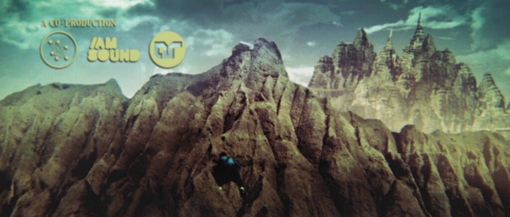 Jagged mountain peaks beneath dramatic cloudy sky
